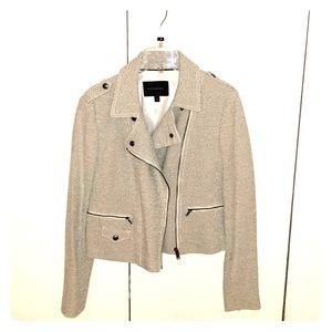 Black and white tweed blazer.